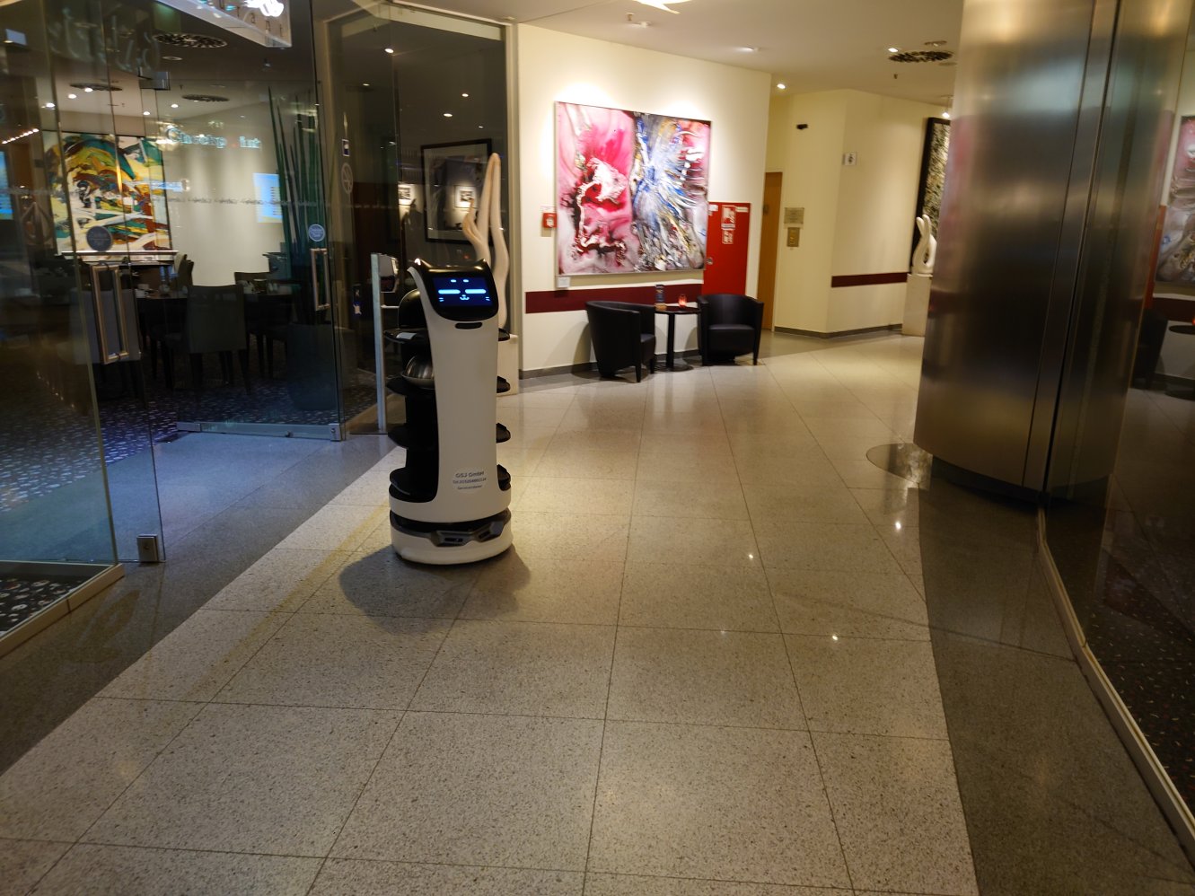 Maunzi, a restaurant robot. MachineLearning. MlCon Berlin. Dec. 2023.